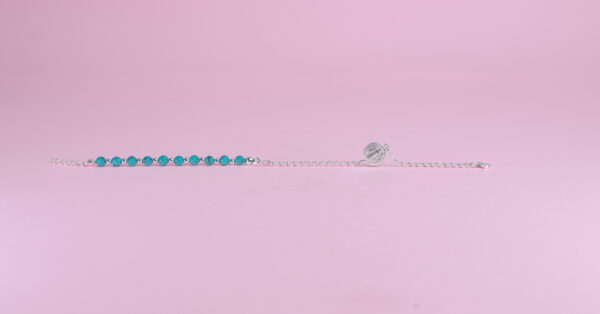 pulsera bola turquenita y san benito plata