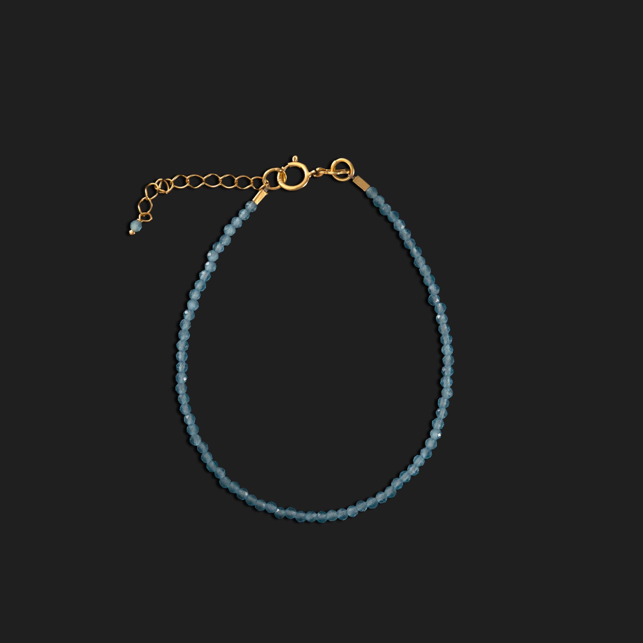 Pulsera topacio azul dorada