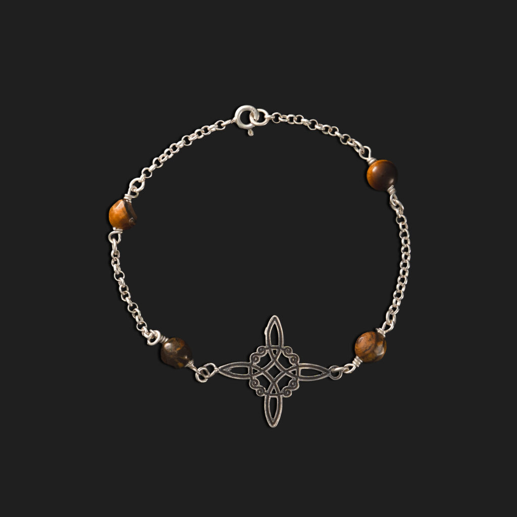 pulsera plata y nudo de bruja con ojo de tigre activada